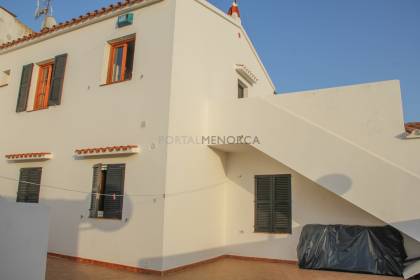 Building with a bar and four apartments in Menorca Calan Porter.