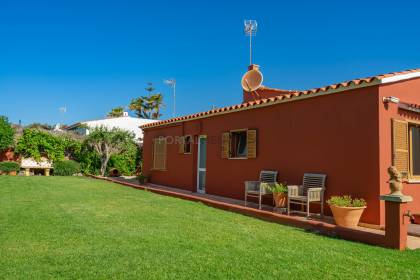 House with sea views and adjoining house on Punta Prima beach.