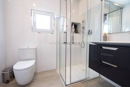Renovated house for sale with garage and two terraces.