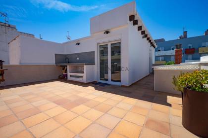 Renovated house for sale with garage and two terraces.