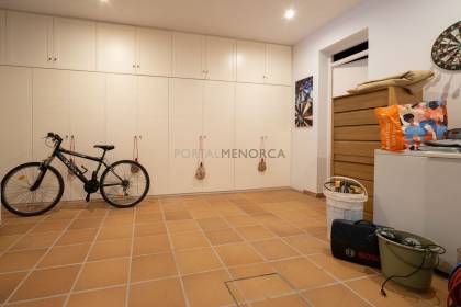 Renovated house for sale with garage and two terraces.
