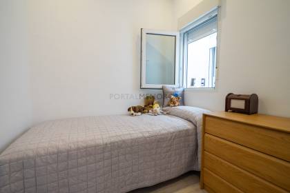 Renovated house for sale with garage and two terraces.