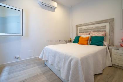 Renovated house for sale with garage and two terraces.