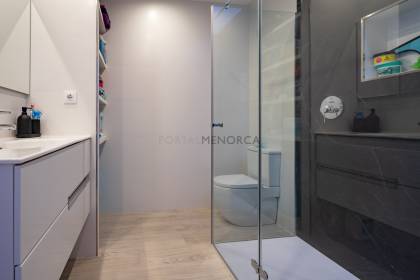 Renovated house for sale with garage and two terraces.