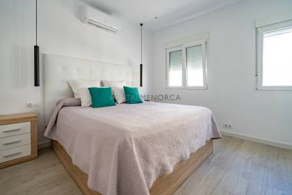 Renovated house for sale with garage and two terraces.
