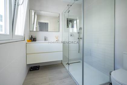 Renovated house for sale with garage and two terraces.