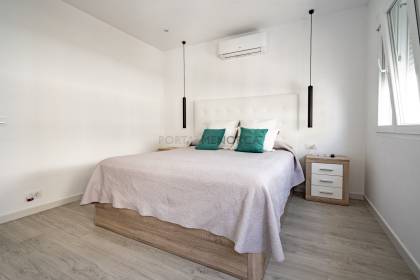Renovated house for sale with garage and two terraces.