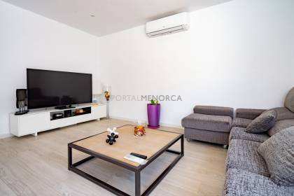 Renovated house for sale with garage and two terraces.