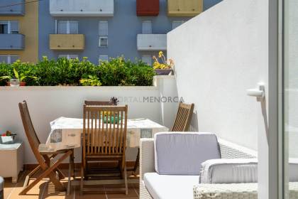 Renovated house for sale with garage and two terraces.