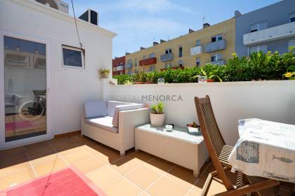 Renovated house for sale with garage and two terraces.