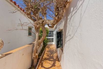 Beachfront house for sale in Punta Prima