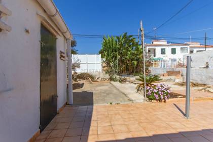 Beachfront house for sale in Punta Prima
