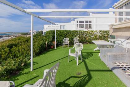 Casita en primera línea de mar en venta en Binibeca
