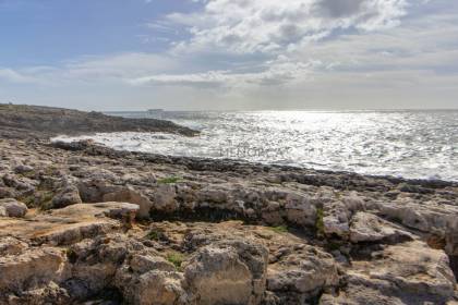 Casita en primera línea de mar en venta en Binibeca